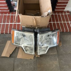 OEM Ford F150 Headlights in excellent condition faros luces nuevas originales Ford