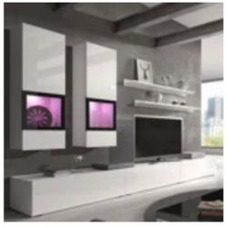 In Perfect Conditions Fits Up To 868n TV. Comes With Floating Book Shelves. Asking $150 Need It Gone ASAP 