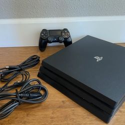 PS4 PRO 1 TERABYTE PERFECT CONDITIONS $400
