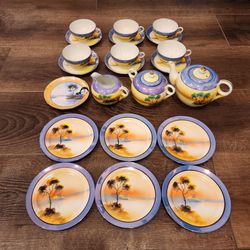 22 piece Swan Sunset made in Japan hand painted Tea Pot Cups Saucer Cream/Sugar, great condition