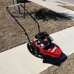 BRAND NEW STRING MOWER TB22TM