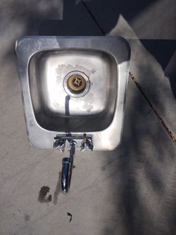 Stainless steel sink. 12x12 x 5 inches deep 17 x15 hole