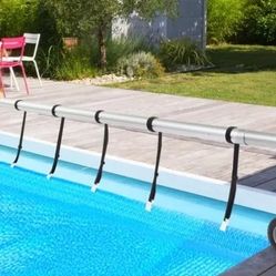 Pool solar cover and reel 
