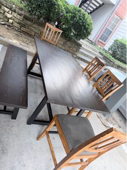 Dining table 4 chairs and a bench asking 150