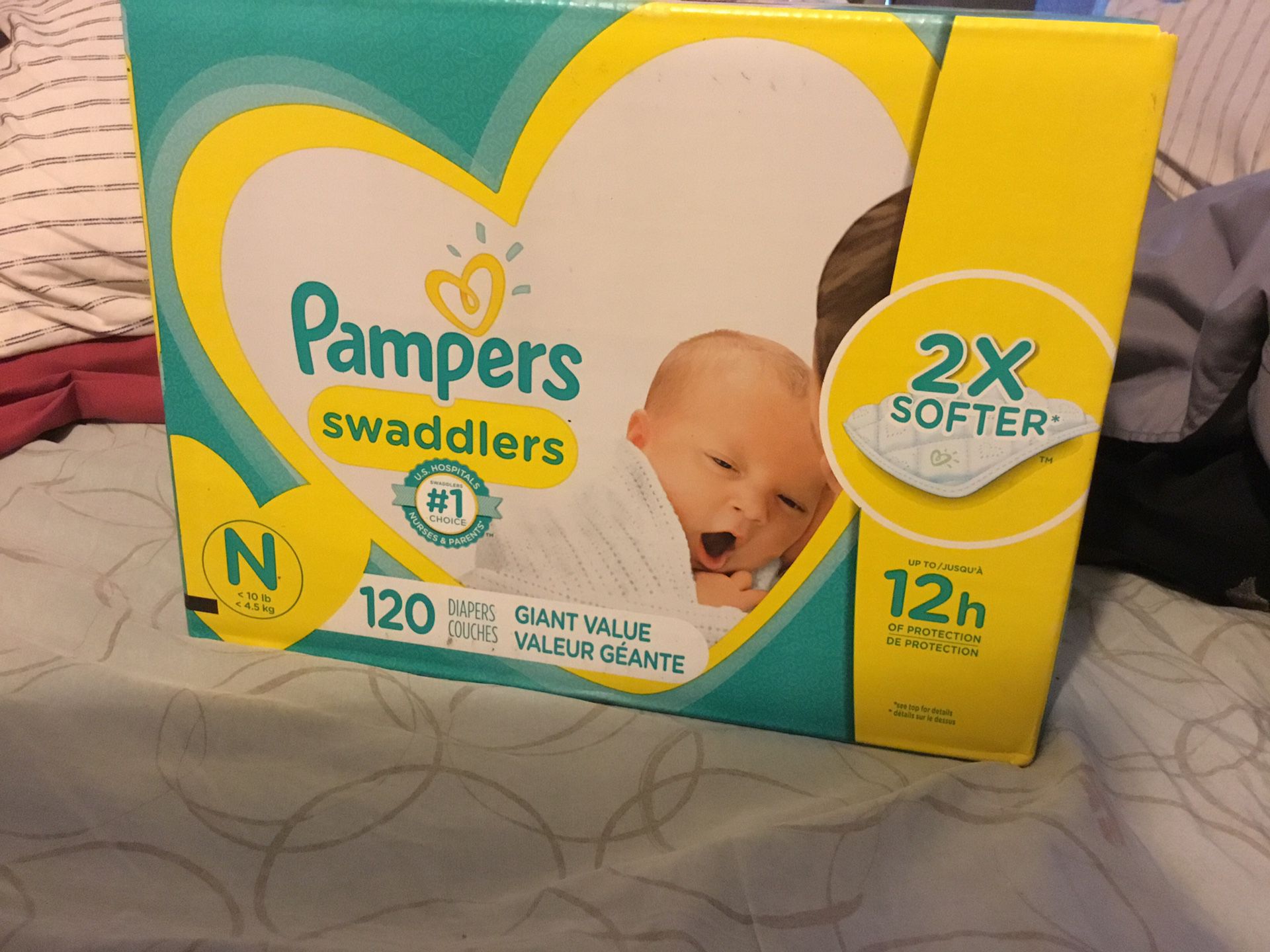 Unopened newborn diapers
