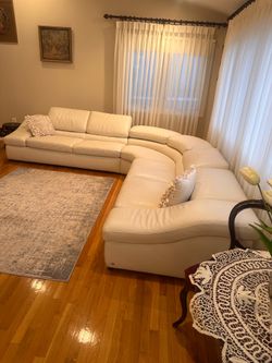Natuzzi Wave corner sectional sofa upholstered in cream leather