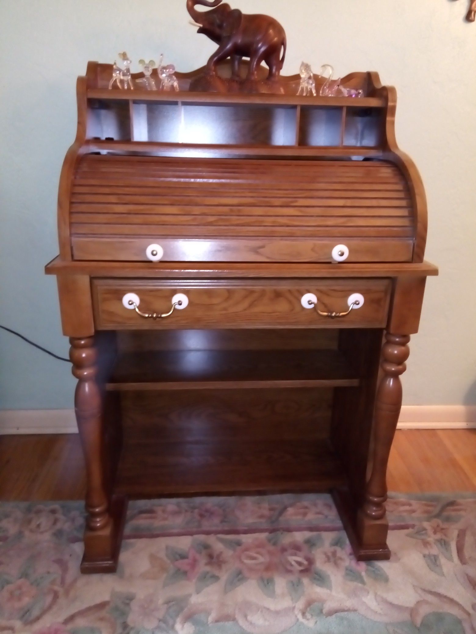 Small roll top desk with light