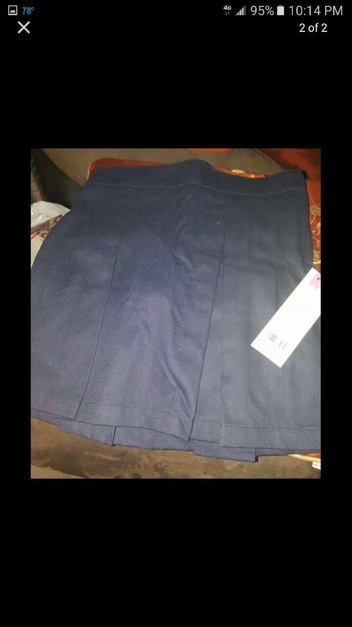 Blue uniform shorts and skirt
