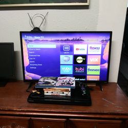 TCL 32"  ROKU TV with Remote Control +  Samsung Blu-Ray Disc Player +  6 Movies