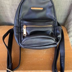 Beautiful Steve Madden backpack purse, black in color