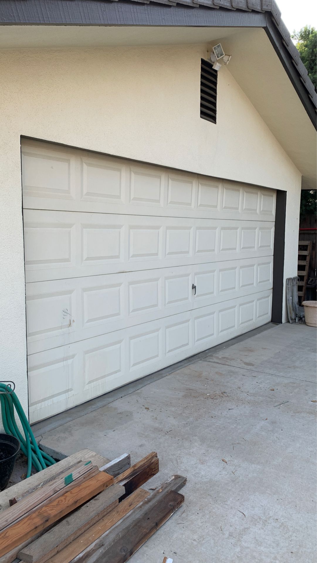 Garage door with opener ( 16’ by 7’ )