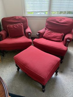 Pair of wide stuffed chairs with foot ottoman; corded throw cushions