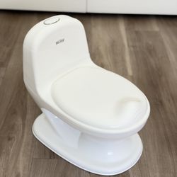 Nuby Toddler Potty Training Toilet with Flushing Sounds