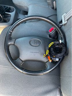 2005–2011 Toyota Tacoma OEM Airbag Clock Spring with a Donor wheel.