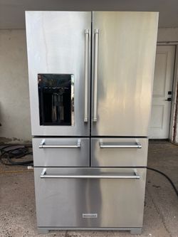 KitchenAid 5 stainless steel  fridge works perfect in good condition. Free delivery to the garage.
