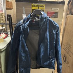 LOW PRICE MOVING- $210 + TAX RETAIL DK RAIN JACKET 