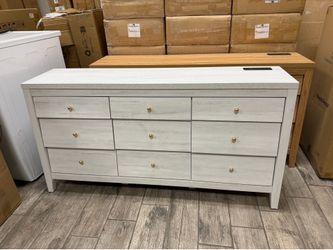 Brand new white 9 drawer dresser with usb and power plugins