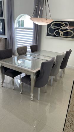 Modern extendable glass top dining table