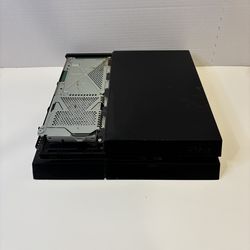 PS4) gaming console, specifically the original model CUH-1115A.