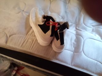White Sneakers with Black and Red Laces