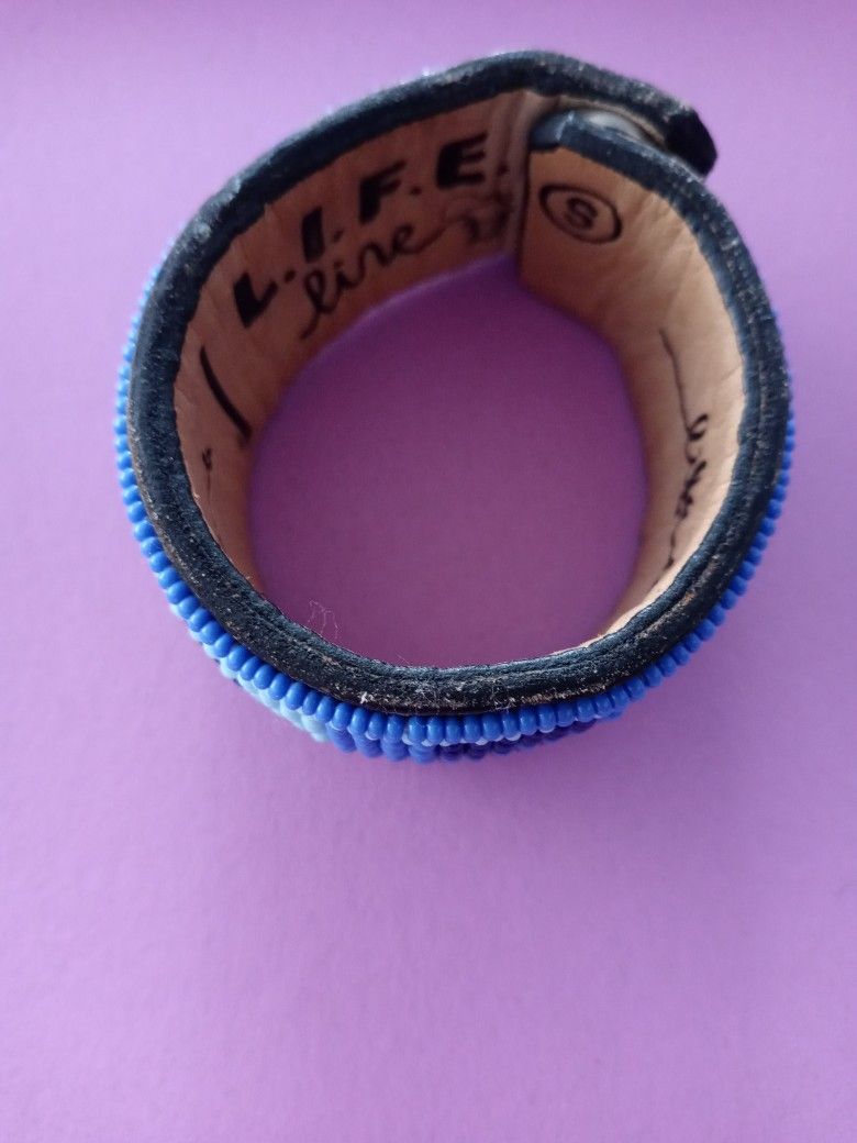 Handmade Leather Cuff Bracelet With A Blue Exterior