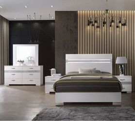 King Size Bed Used Like New.  Dresser & 2 Nightstands Included