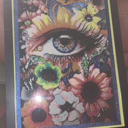 diamond painting of eye and flowers
