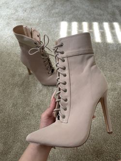 Lace up high heel boots