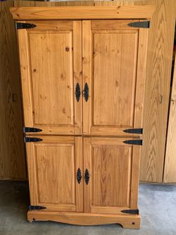Pine Cabinet with closing doors and adjustable interior shelving