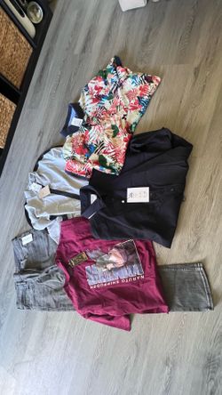 Bundle of men’s shirts with tags