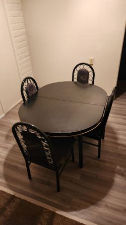 Black Oval Dining Table with 6 Chairs