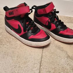 Boys red Nike high tops size 4.5y