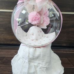 White And Pink Baby Girl Gift Set. Balloon In A Box With A Baby Girl Hat And A Blanket