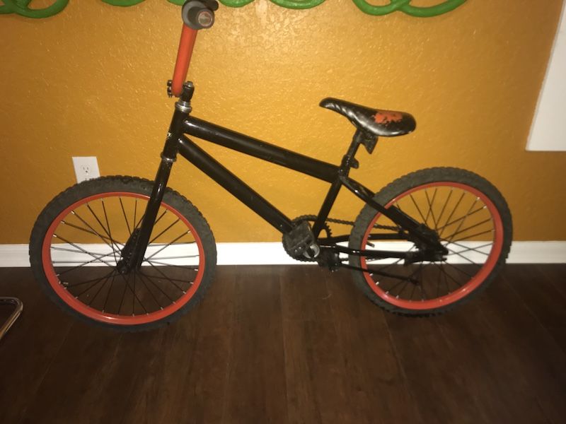 Huffy 20” Rock It boys bicycle bike black and orange in excellent condition. Price is firm!