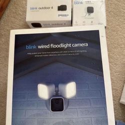Blink Outdoor 4 Floodlight Camera, And 2 additional cameras, And a module  - All you Need To Cover Your House ( Total 4 items)- NEW