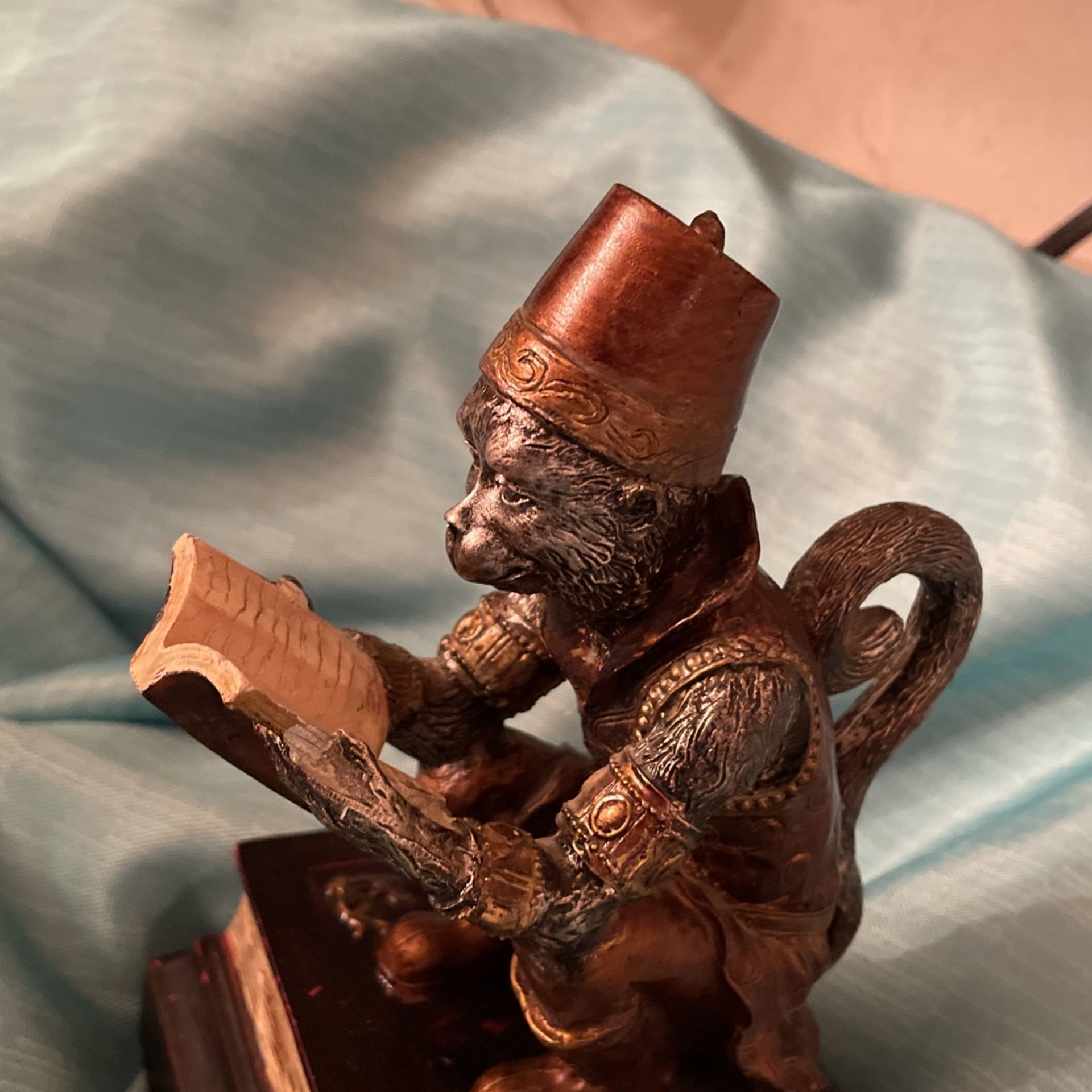Monkey Statue reading book on Books