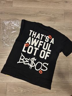 “Black” “That’s a Awful lot of Be$os” graphic tee with white text and orange lips#bezos