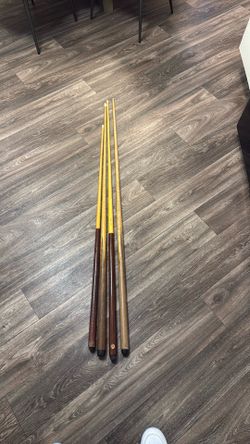 Pool sticks .