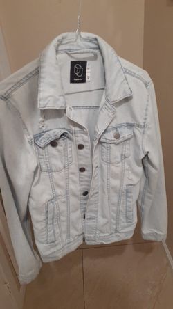 Light blue ripped jean jacket