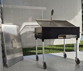 Stainless steel Handmade Outdoor Grill with Iron Case, Lide & Fire Brick Base for Uruguayan Parilla.