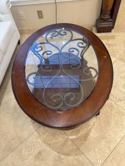 Designer Sofa and Round Wood and Glass Coffee Table