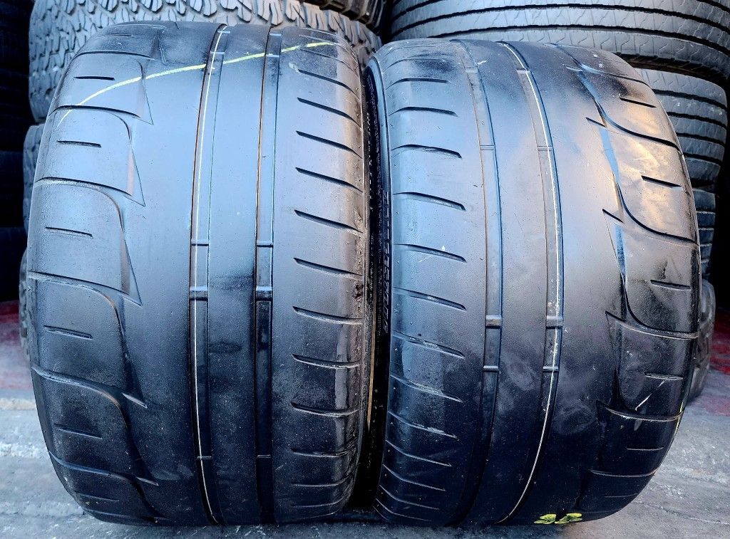 2 USED TIRES BRIDGESTONE 305/30/19