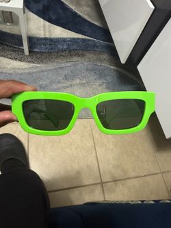 Green Gucci sunglasses