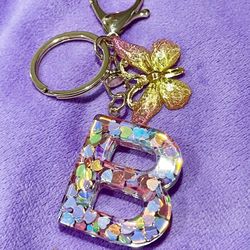 New Letter Alphabet Keychain Crystal Resin  (Nuevo).  NO TRADES.   NO SHIPPING.  (EAST PALMDALE)