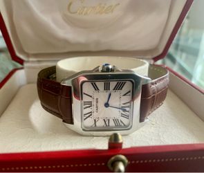 Watch unisex 30mm. Double strap (leather & steel) quartz movement like new. Miami Shores area pick up
