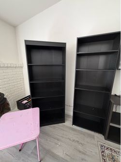 3 tall Black book shelves