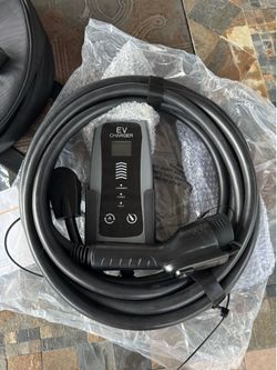 Level 2 EV Charger. 240v 40Amp. Comes complete with mounting hardware. Brand new in cary case.