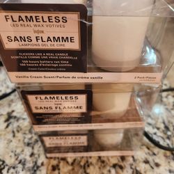 3 (2) flamless battery Operated votive candles.