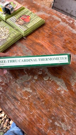 See thru cardinal thermometer