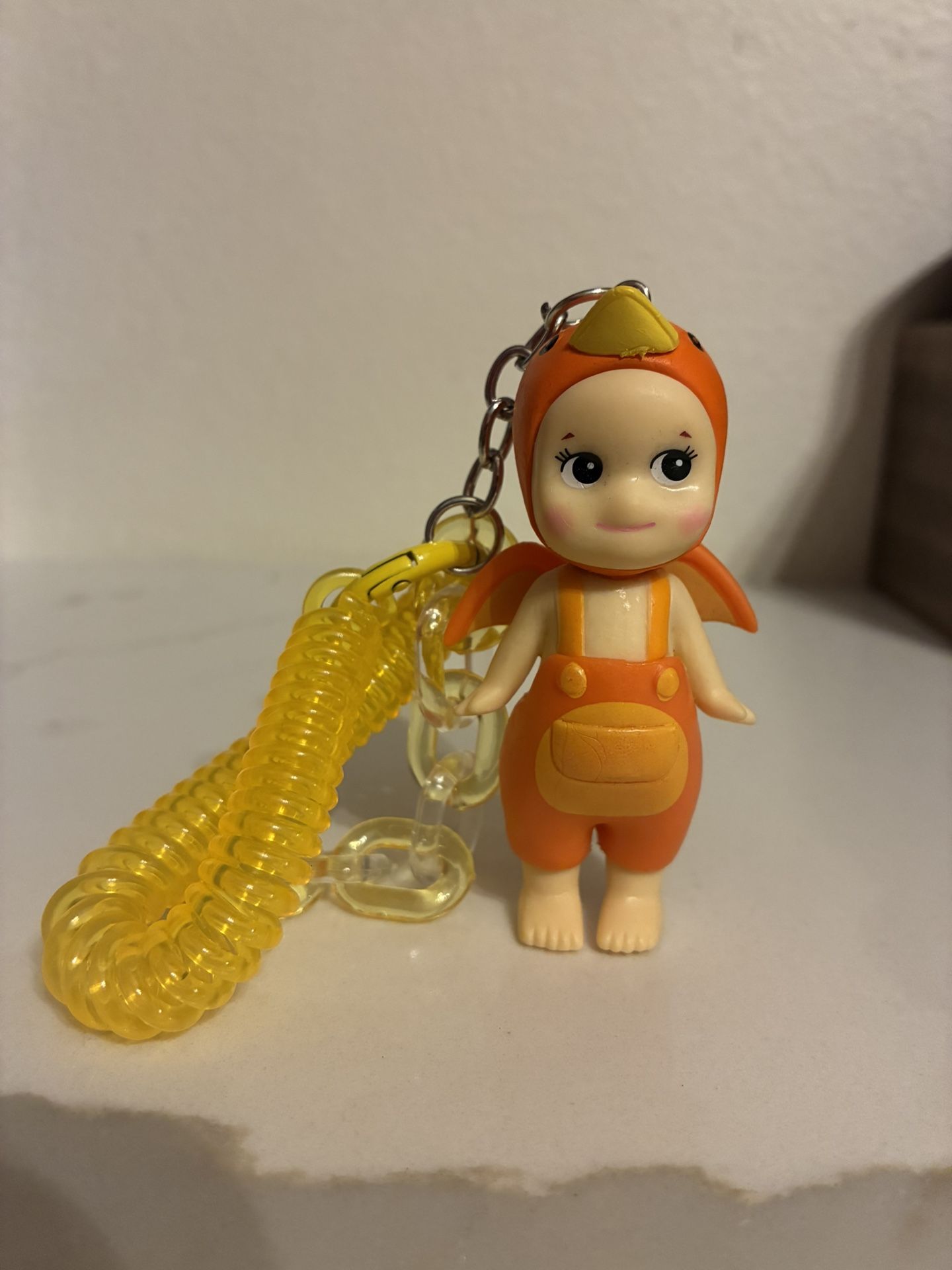 Sonny Replica Angel Keychain Orange Dinosaur